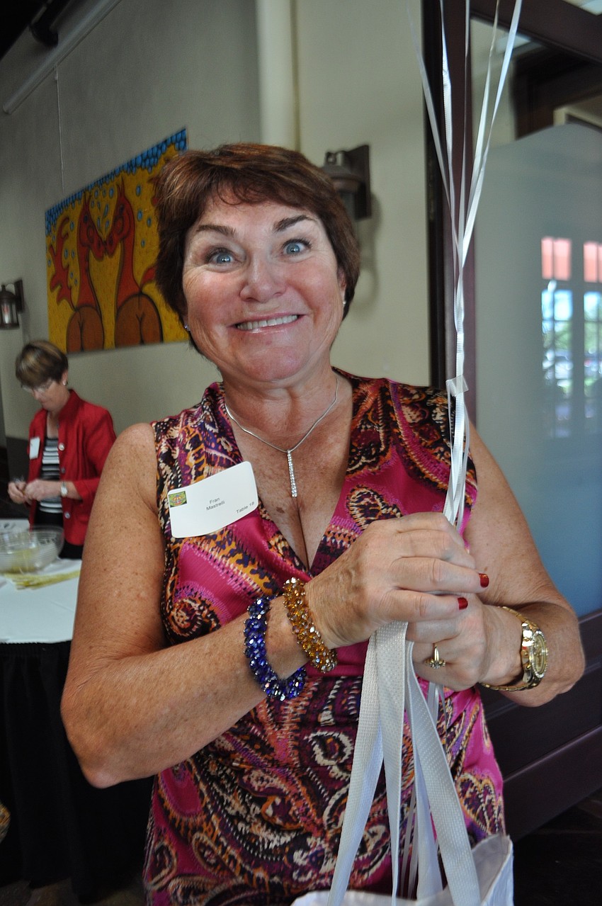 Fran Mastrelli promotes the raffle.