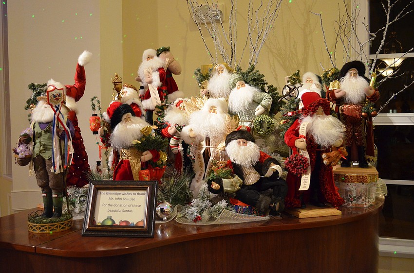 More than a dozen Santa figurines were donated to The Glenridge to display from John LoRusso.