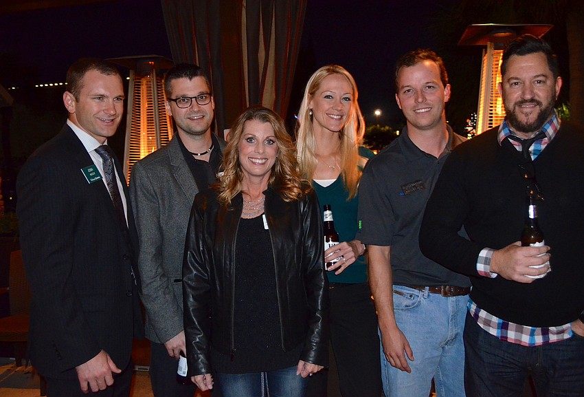 Josh McCoy, Dr. Brad Masuga and his wife, Ashley, say 