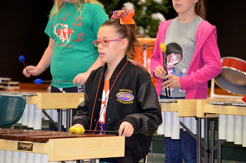 Brooke Gore focuses on the rhythm of the song.