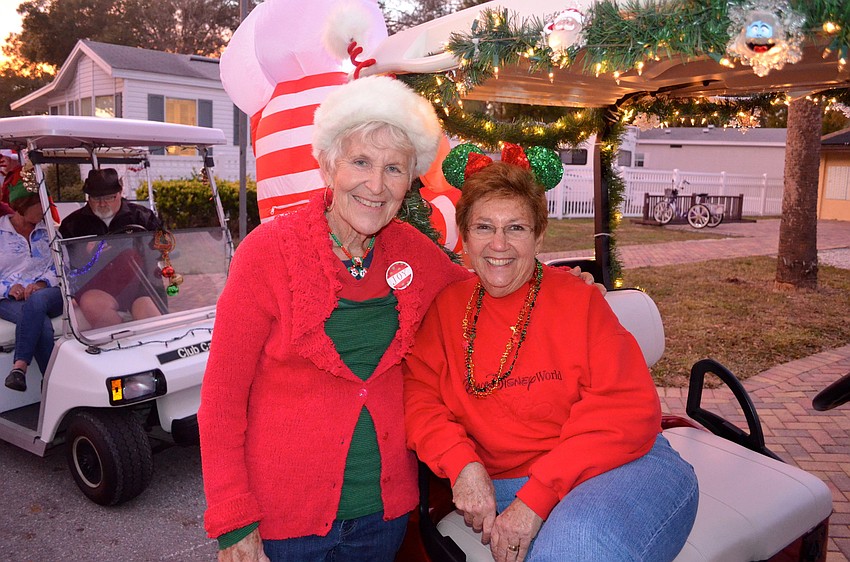 Marge VanRenterghem and Verla Lashbrook love holiday accessories.
