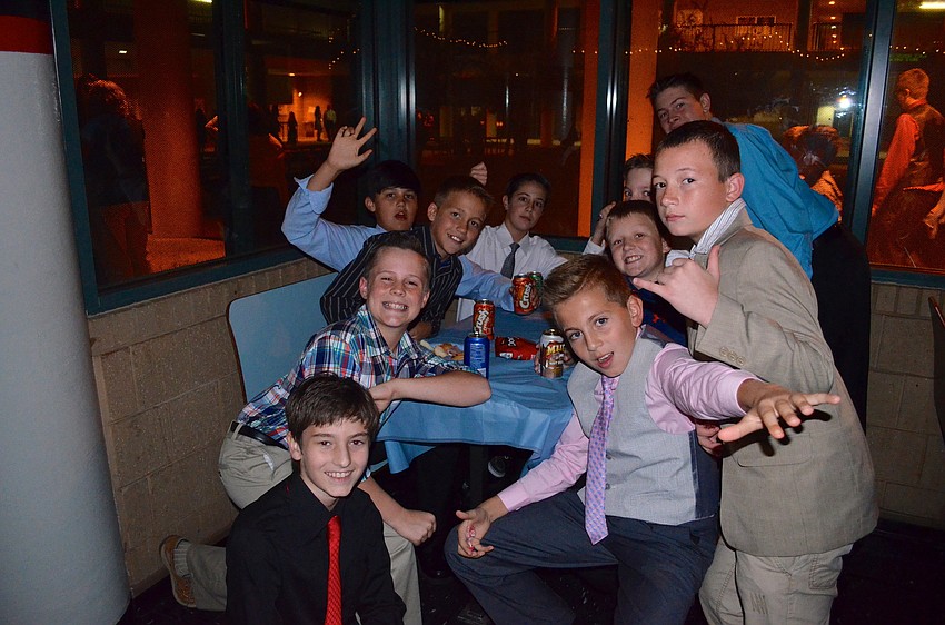 The boys play around in a booth between songs.