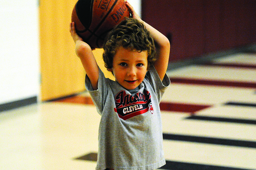 Five-year-old Phoenix Radosevic enjoys participating in Braden River High's basketball camp.