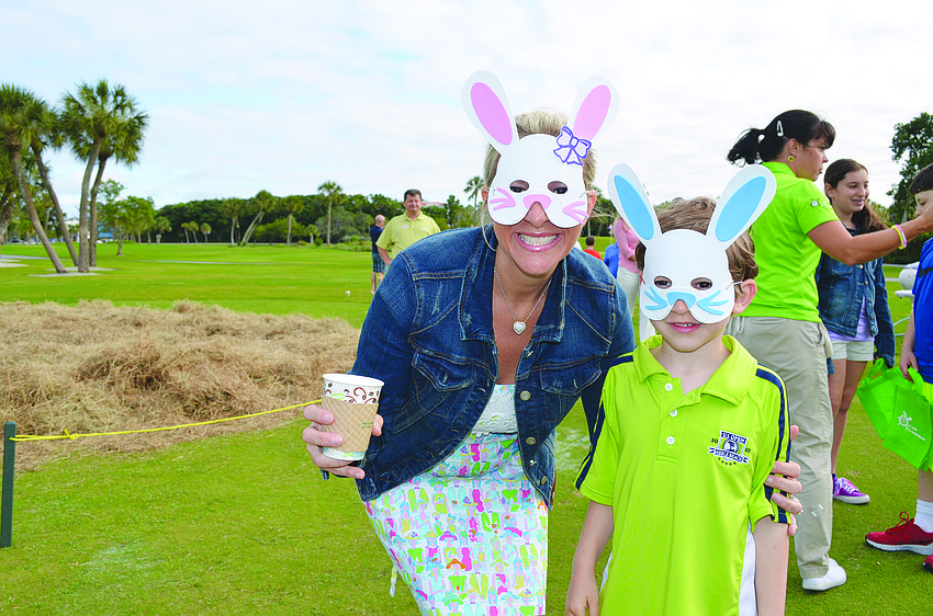 Tiffany and Ethan Stein display their bunny masks April 20, at the Longboat Key Club's Easter brunch.