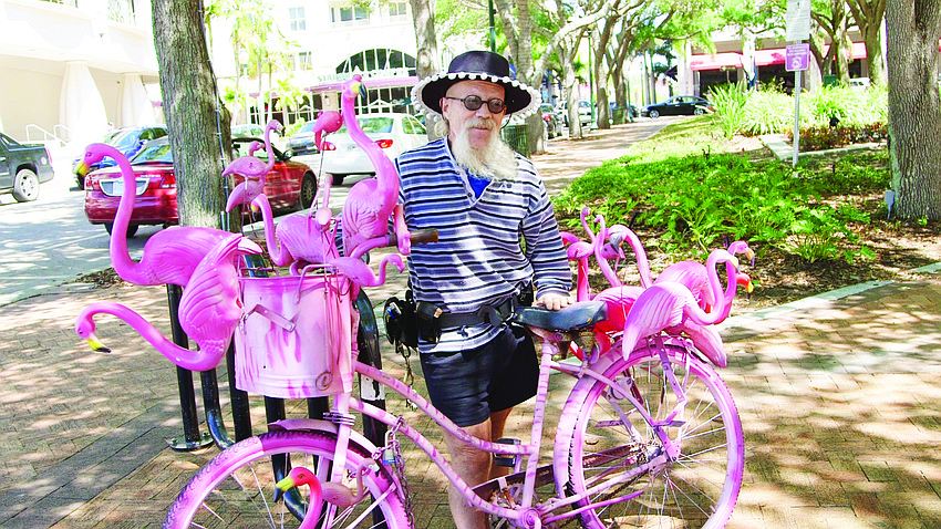 Dr. Nik Gapeto has many creative jobs, but he may be best known for his flamingo bicycle.