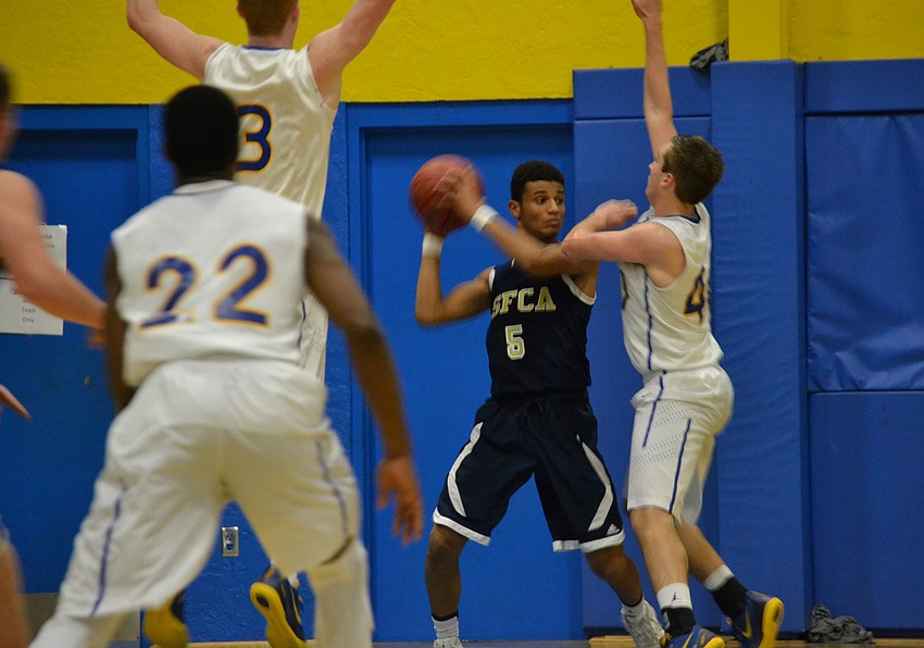 Terrance deAvila faces the Sarasota Christian School defense.