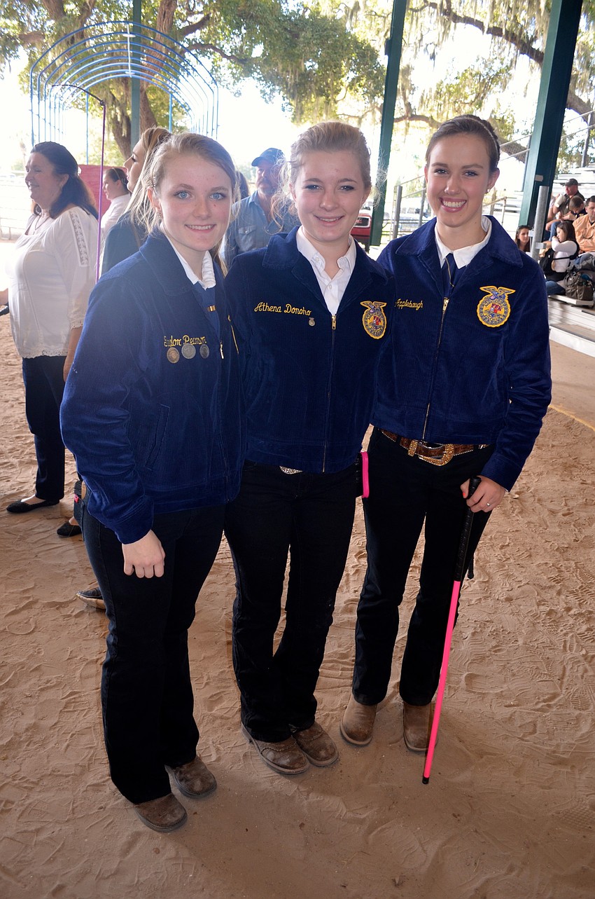 Lakewood Ranch High students Taylor Pearson, Athena Donoho and Hannah Applebaugh say cheese.