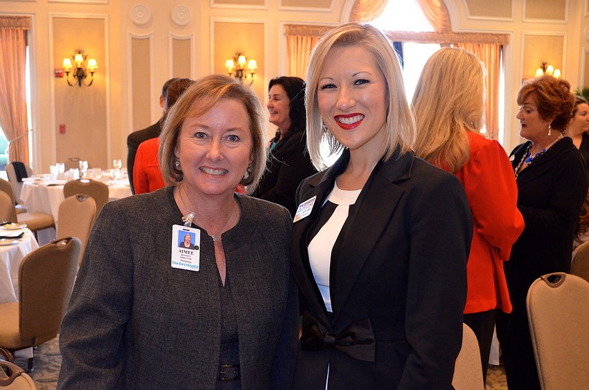 Aimee Bennett and Michelle Mohr Hange make new contacts at the event.