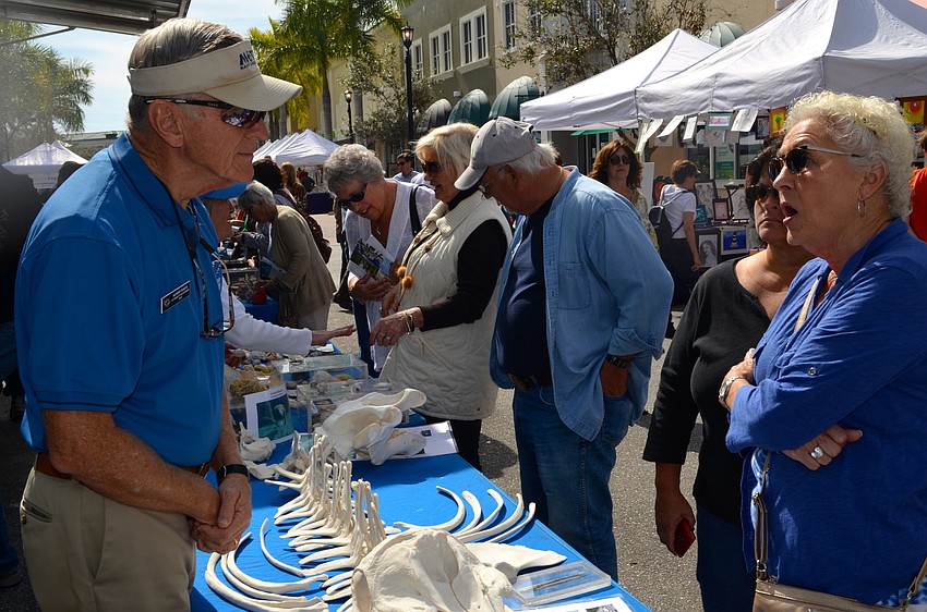 Morris Emigh educates Barbara Fields.