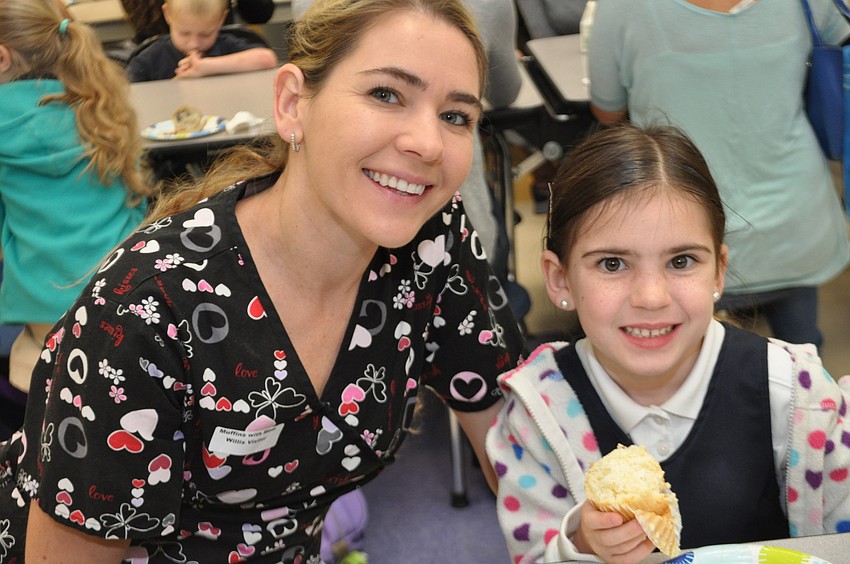 Kira and Angel Keelan feast on muffins.