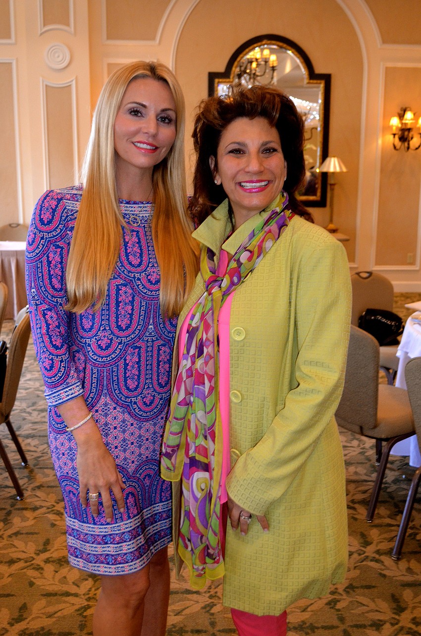 Melissa Howard and Shelly Glenn show support for the event, Which benefited the temple's religious school.