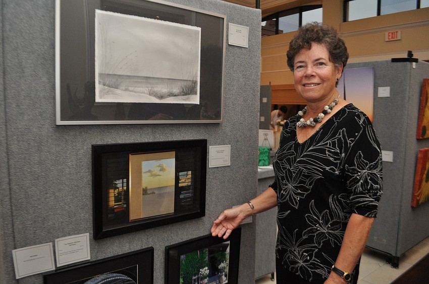 Charleen Gorbet shows off her photograph, 