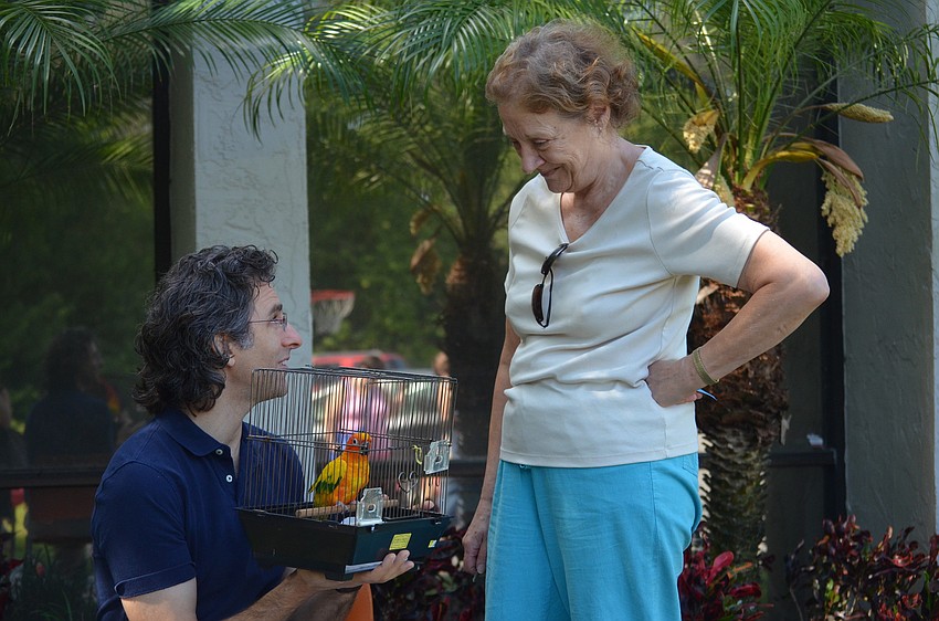 Rabbi Brenner Glickman blesses Spike with Linda Wolff.