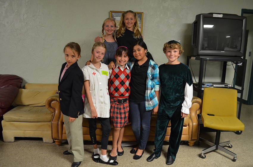 Gryffin Wilkens-Plumley,10, Austin Bonacuse,10, Zoe White, 11, Ihea Malin, 9, Rylee Martin, 10, Melissa Erresuris,11, Ryan Modjeski, 10 perform scenes from Snow White