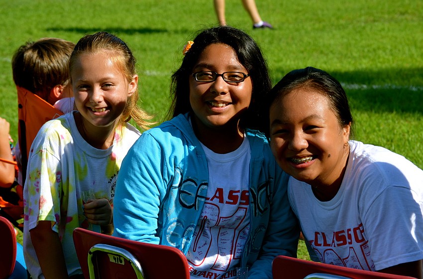 Nicolette Woodruff, Marifer Sanchez and Michelle Mai wait for their turns to participate.