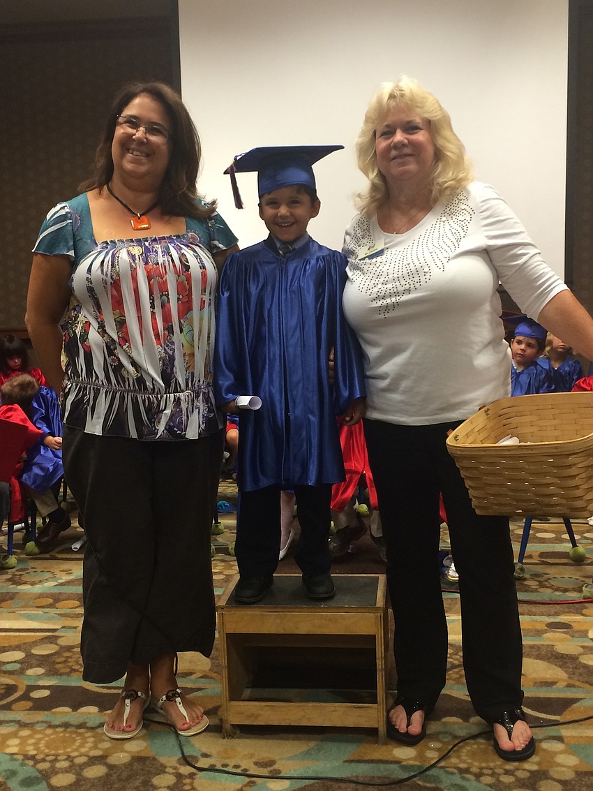 Teachers Karin Kiernan and Debbie Frazzoni with Diego Castellanos