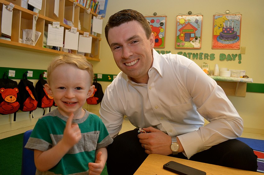 Andrew Jones is all smiles with his father, Ben.