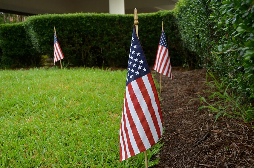 Residents decorated the Palm Aire community with American flags.