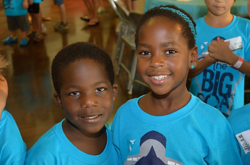 Sammie White and Brianne Gamlin get ready for their next activity after lunch.