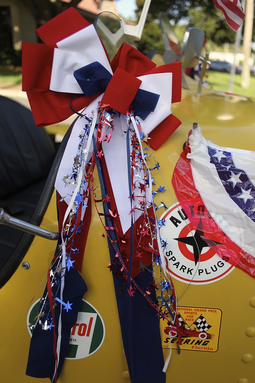The Carmanâ€™s decorate their yellow Bugatti every year for the parade.