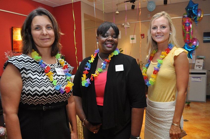 Victoria Pettograsso and Shekeanna Rice, of Coastal Care, meet up with Krista Adams, of Blue Skye Lending.