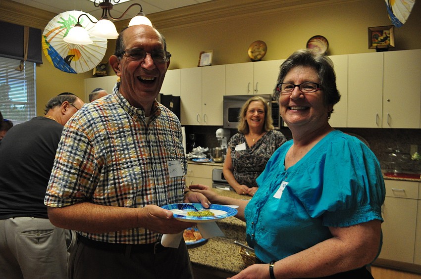 Larry and Martha Oppenheimer enjoy gathering with friends.