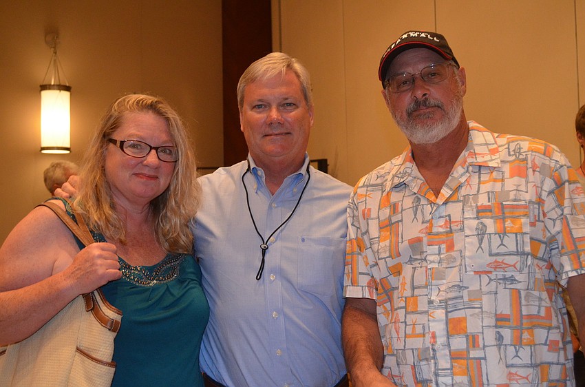 Julie and Jim Milner with Jeff Emery