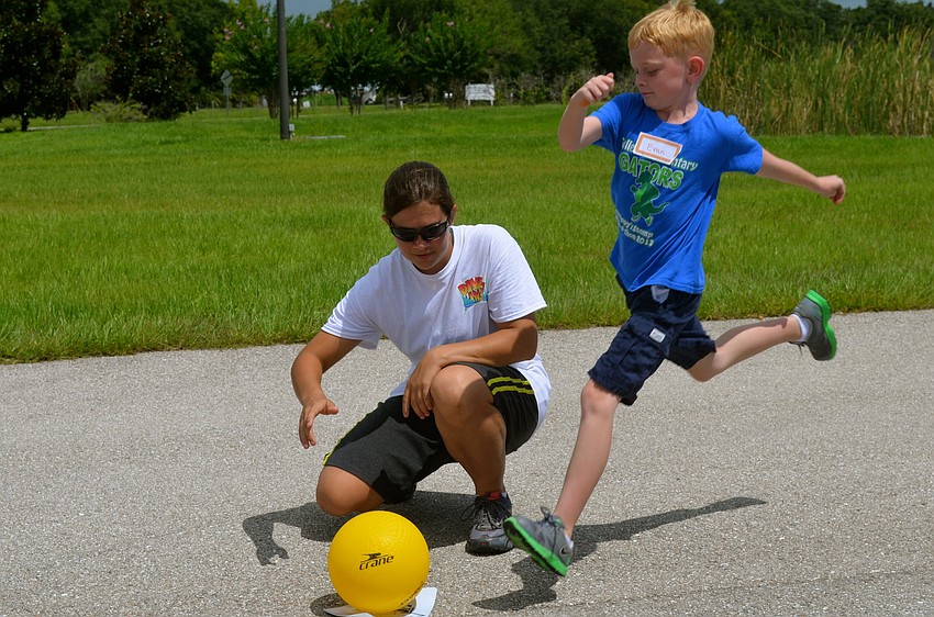 Evan Brown winds up to kick the ball.