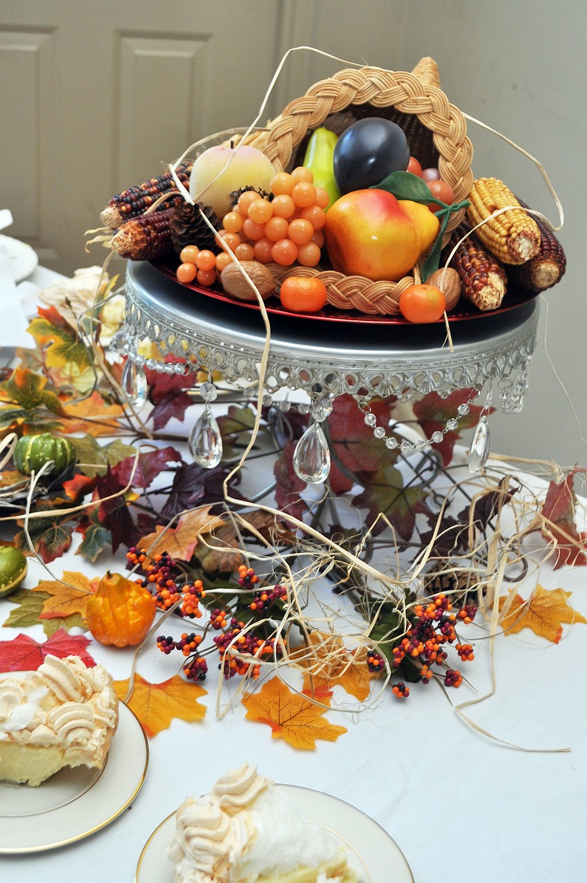 Longboat Island Chapel members enjoyed a Thanksgiving Dinner summer social Thursday, July 31.