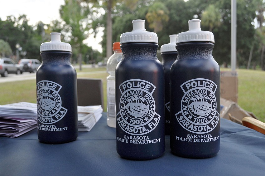 Guests were encouraged to take home crime prevention resources as well as gifts such as these water bottles at National Night Out Against Crime.