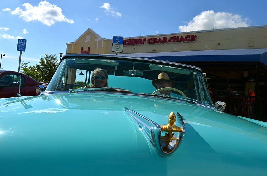 Robyn and Howie Drourr show off their '56 Lincoln Premiere Convertible.