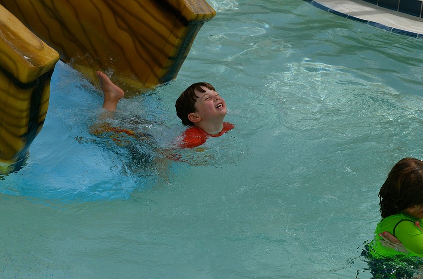 Lucas Flynn plays around in the pool.