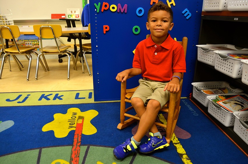 Bradyn Bobbitt gets settled into his new classroom.