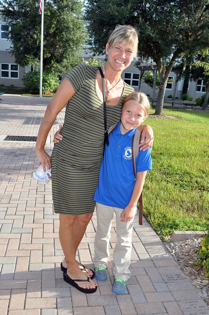 Peggy Cote with her daughter Elle on her first day of 3rd grade