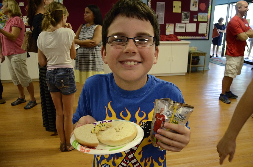 Garet Pearson, 9, prefers his bagels without butter or cream cheese.