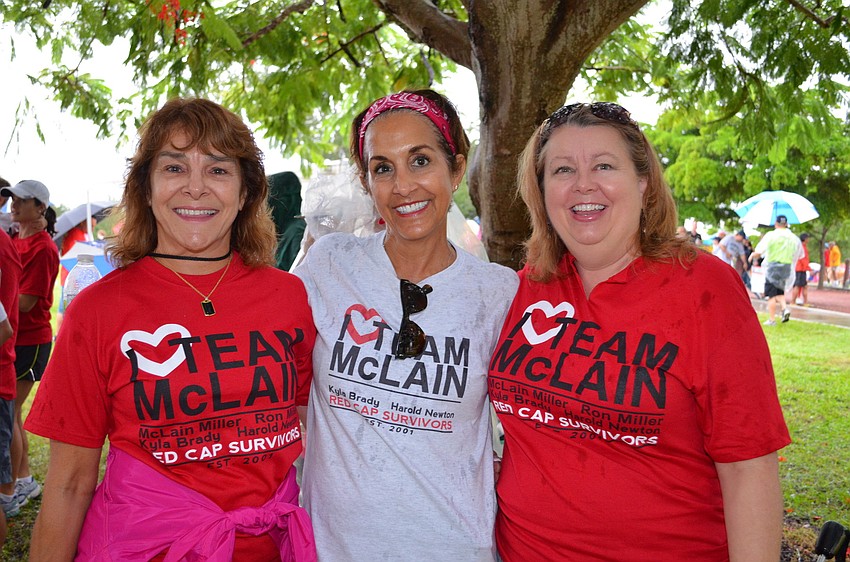 Tricia Dickerson, Patti Eisemann and Dawn Wiley show their support for Team McLain.