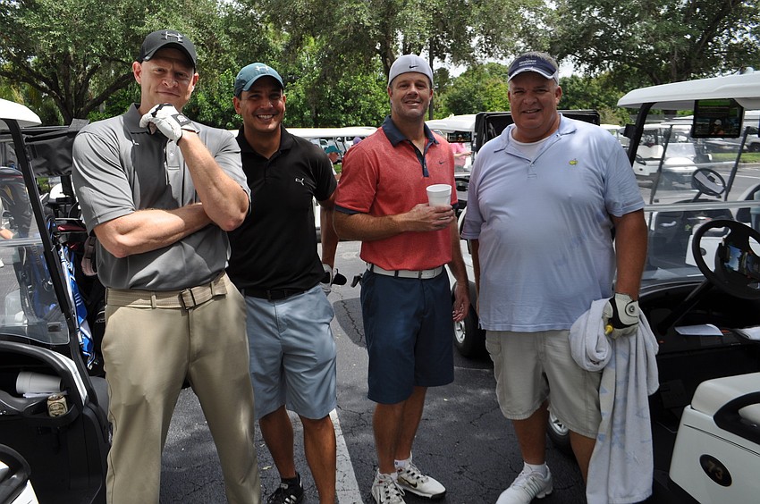 Doug Drabina, Mike Machowski, Stephen Cheatham and Rocky Purvis are ready to get on the course.