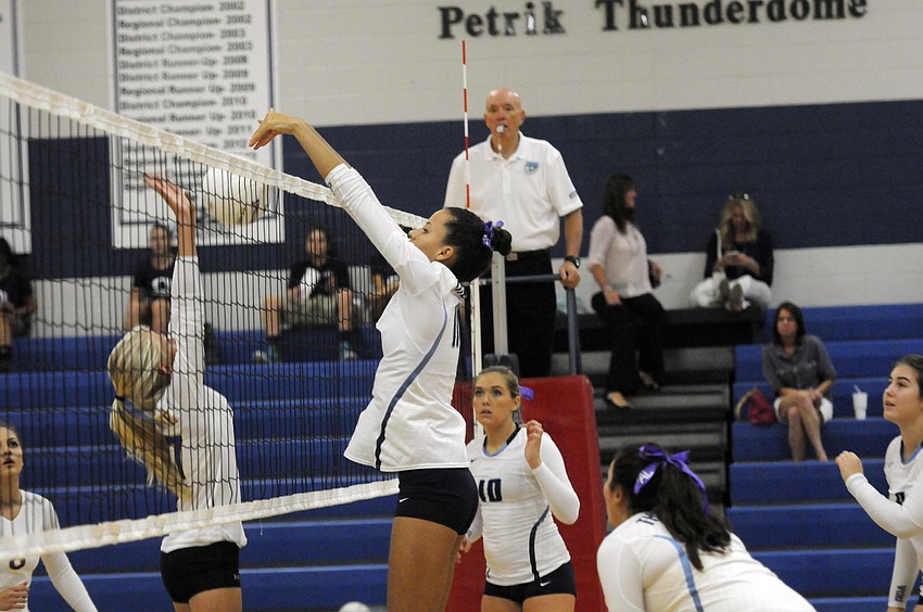 ODA senior Reanna Gregory scores a point for the Lady Thunder in the first set.