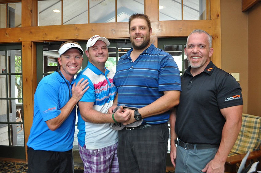 Wayne Parrish, Richard Murray, Jason Smith and David Polimeni shot a 59.