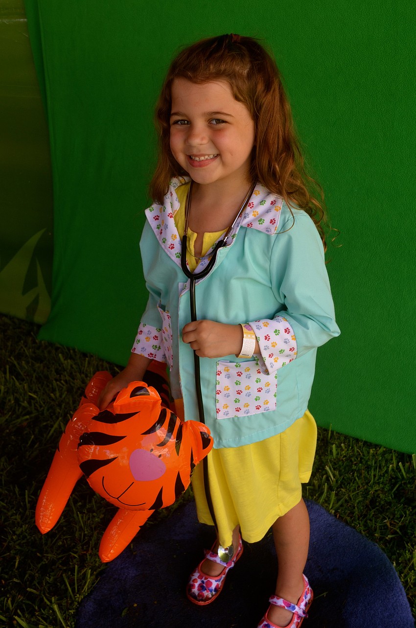 Ella Wood dresses up as a veterinarian.