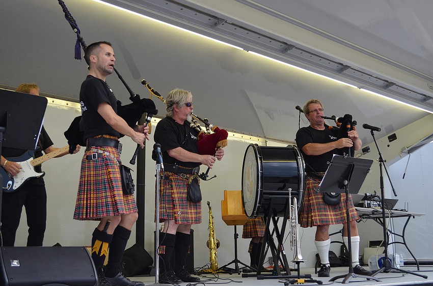 The Jacobites Pipe & Drum Band perform at the National Night Out Against Crime event at Payne Park.