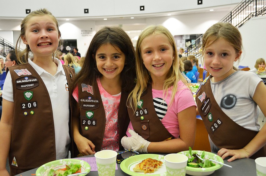 Members of Troupe 206 enjoy pizza to kick off the Scout About the Library event.