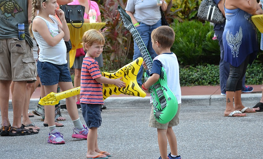 Rowan Callaway and Michael Clementi give their best air guitar impressions.