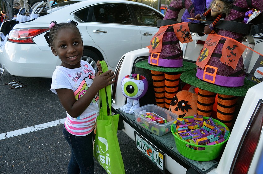 Kriszyah Dickins enjoys getting candy.