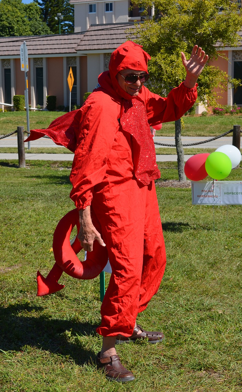 Bob Ferrell dressed as the red dragon on the Welsh flag.