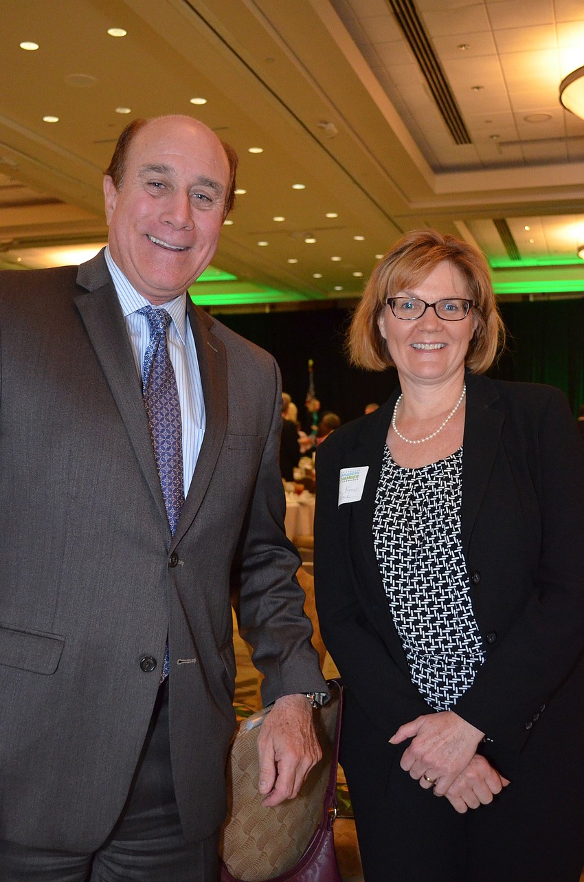 Bill English and Veronika Kroos.