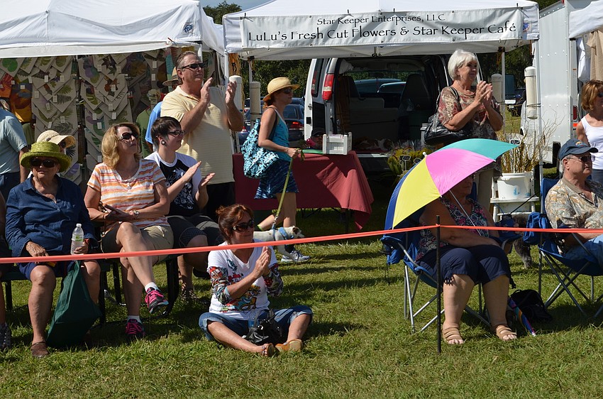 A crowd gathered to watch the 17th annual Howl-o-Ween Pet Costume Contest hosted by the Humane Society of Sarasota County.
