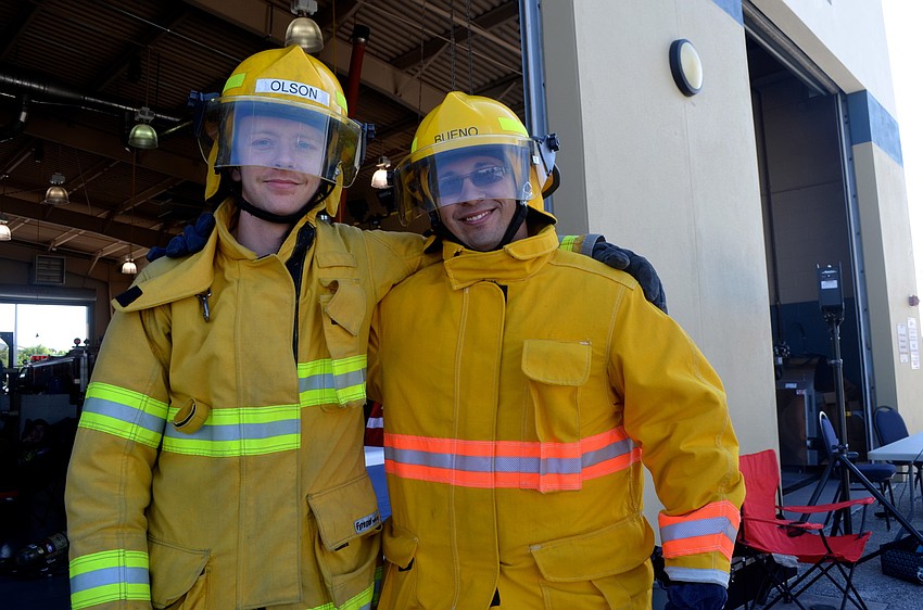 Matt Olson and Alejandro Bueno take a break after finishing the course.