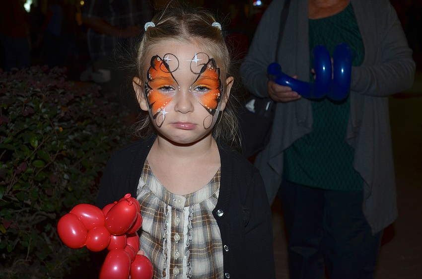 Zsoka Moldovanyi shows off her face paint.
