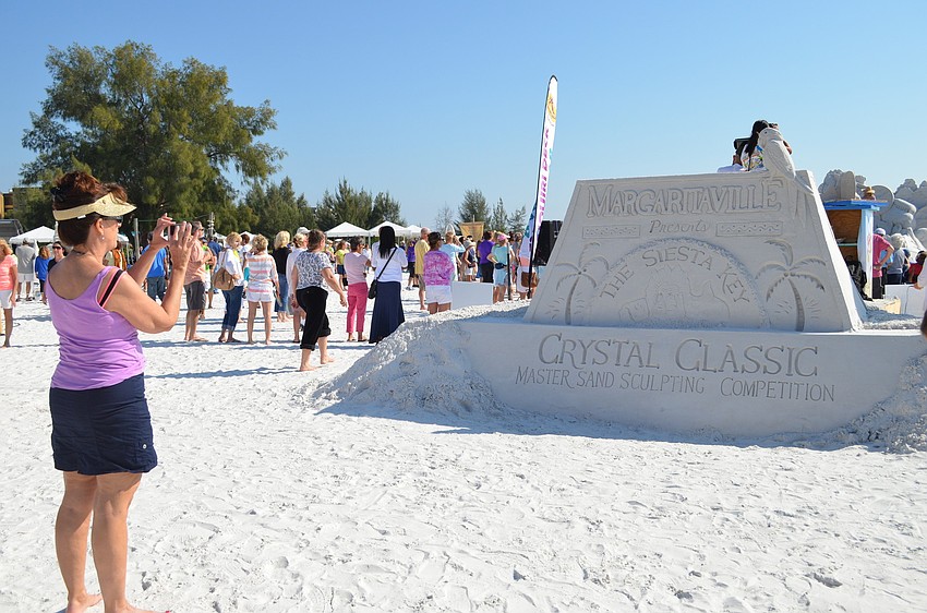 A sand sculpture greets attendees as they enter the Crystal Classic Sand Gallery to view competition entries.